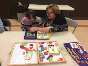 Photo de bénévole auprès de membre